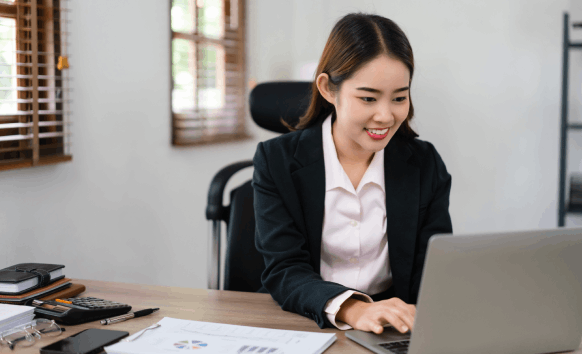 A translator proofreads a rush document for Translation Services in Jersey City, checking accuracy line by line on paper.
