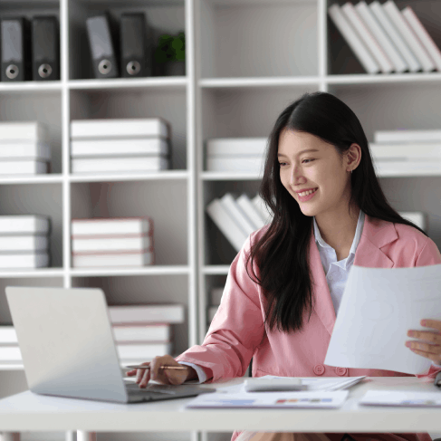 Translator types certified technical content on a laptop, using Translation Services in Union City to match industry.