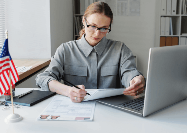 Client reviews a certified USCIS birth certificate translation on a laptop with Translation Services in Union City.