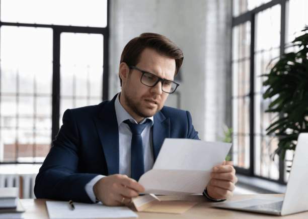 A project manager reviews a contract on a desk, highlighting Translation Services in Hoboken for corporate documents.