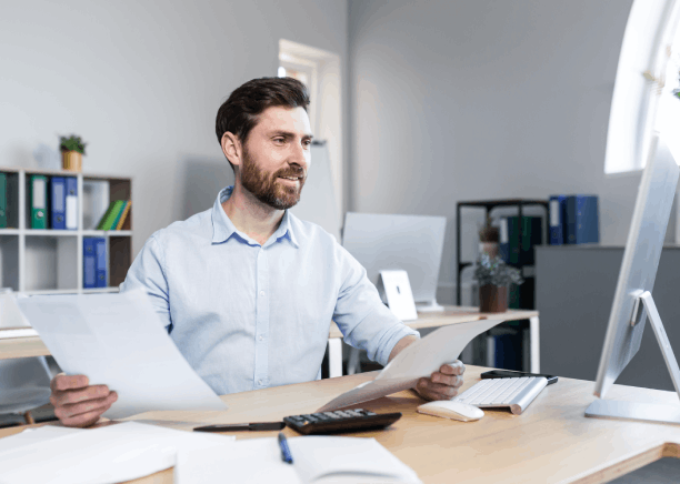 Project manager checks a localized business website in two languages, relying on Translation in Newark to ensure smoothness.
