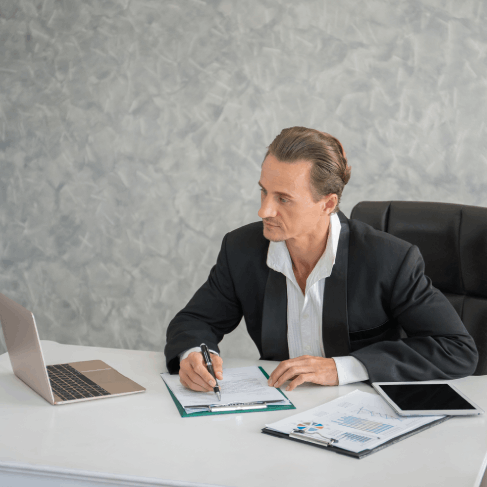 A manager reviews a contract draft with Translation Services in Union City business support, checking bilingual terms.
