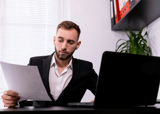 A translator checks a personal letter for accuracy, highlighting Translation Services in Newark for individual document.