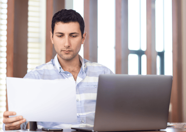 A skilled linguist verifying every detail during legal doc translation to help NJ resident submit error-free certified paper.