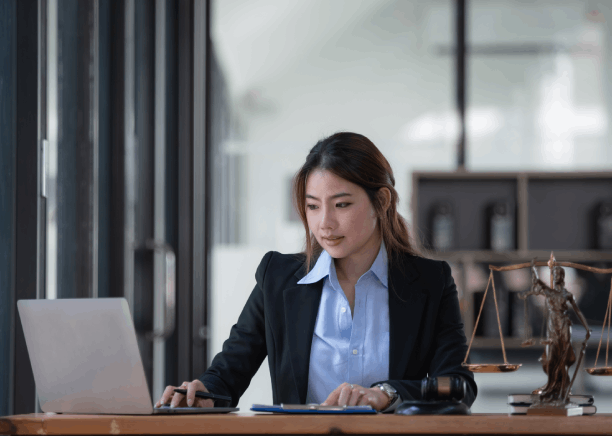 Lawyer checks a certified legal translation with a notary seal for compliance, using Translation Services in Hoboken.