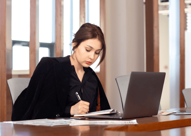 A translation expert reviewing docs to complete the legal document translation process for courts, USCIS, and institutions.