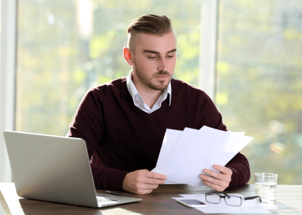 Client completes an intake form for Portuguese Translation Services in New Jersey for individual document needs.