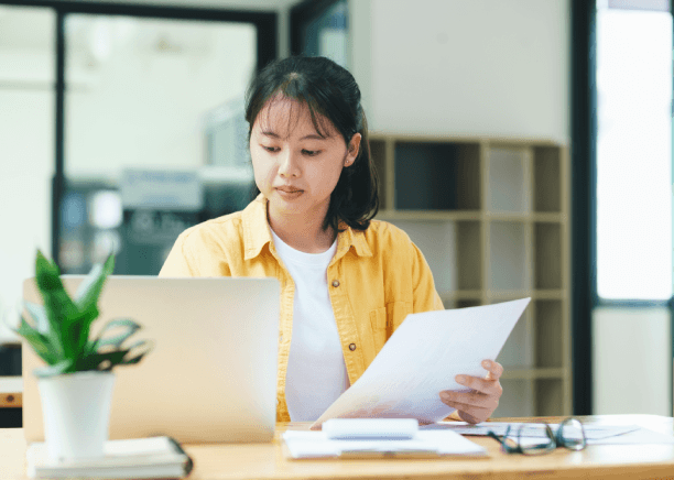 A specialist formats engineering specs with Portuguese Translation Services in New Jersey for technical document compliance.