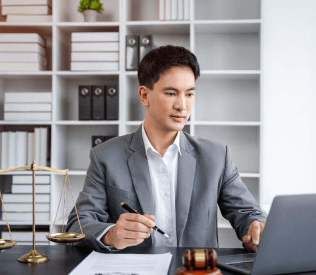 Lawyer reviews a contract while Portuguese Translation Services in New Jersey deliver a precise legal English to Portuguese.