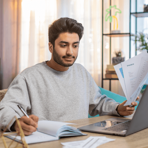 A linguist consults dialect notes for Portuguese Translation Services in New Jersey to match Brazilian and EU wording.