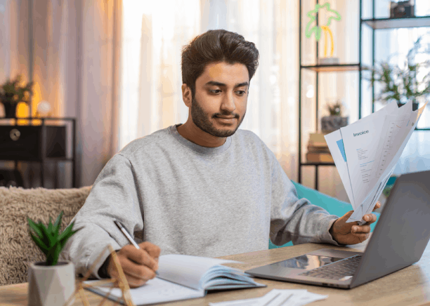 A client receives a translated packet at a front desk, reflecting document support from Translation Services in Hoboken.