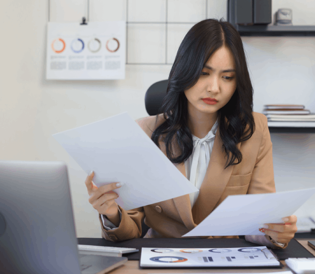 A translator runs a terminology QA checklist on a laptop as Translation in Newark delivers certified technical translation.